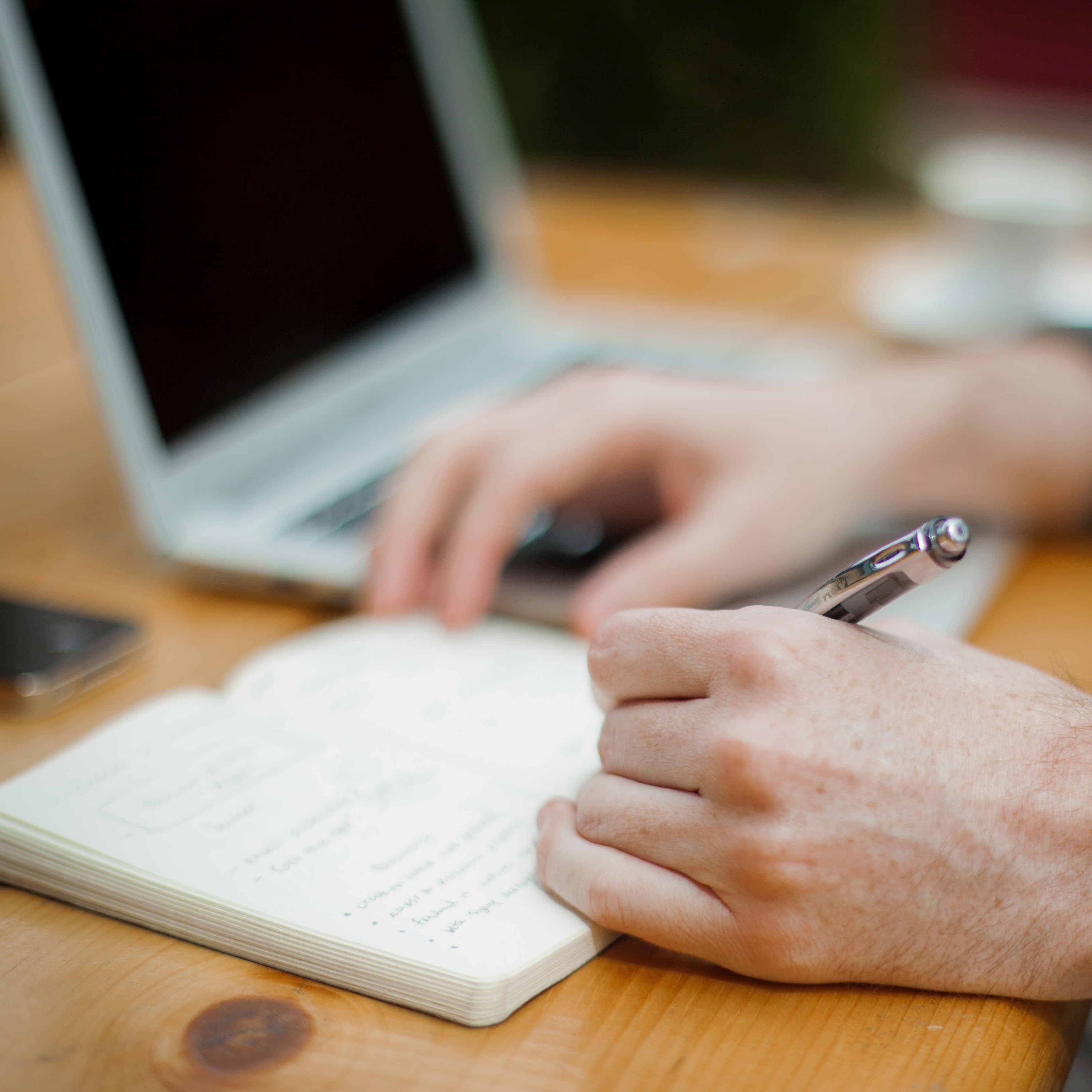 Writing content on a laptop